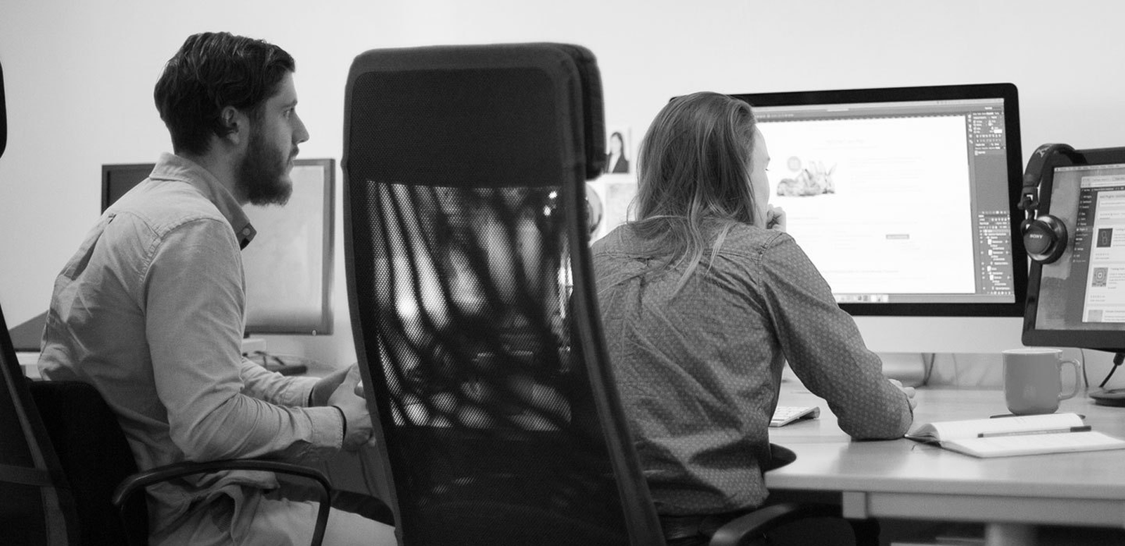 Web designer working on client website